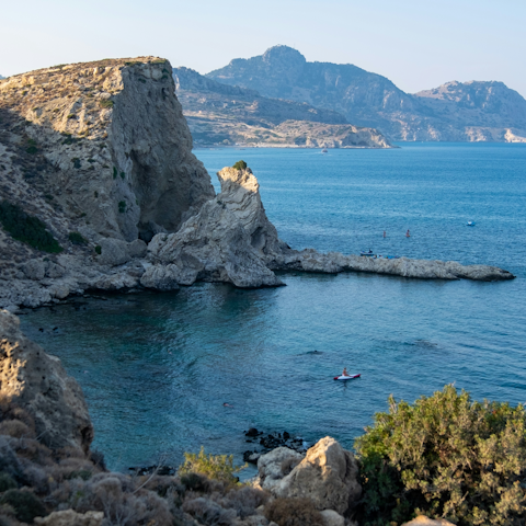 Explores Rhodes rugged coastline