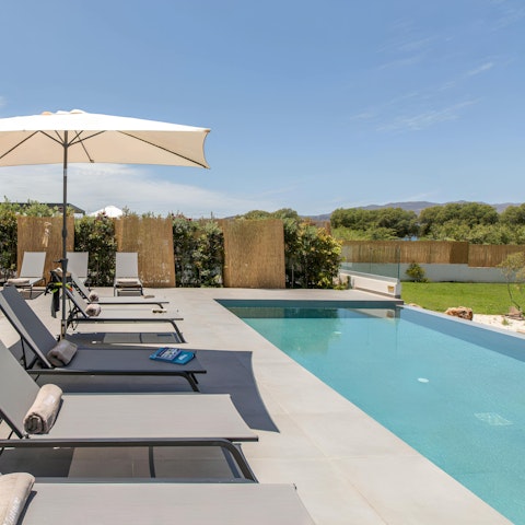 Relax on the poolside with a good book