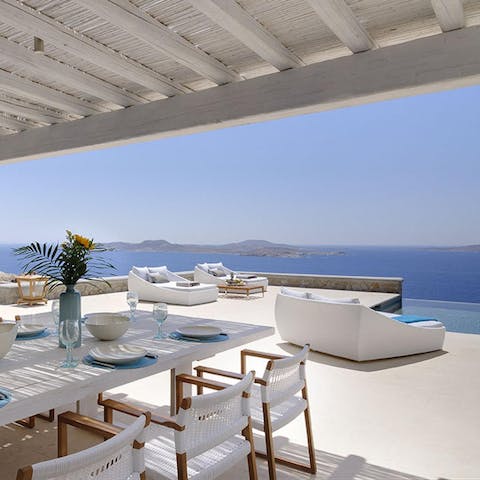 Light the barbecue and watch the sun set across the horizon