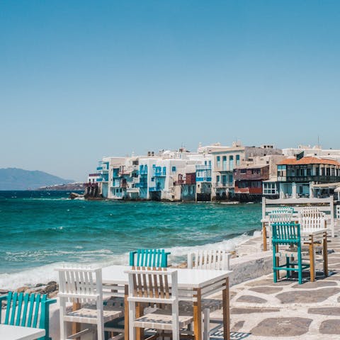 Immerse yourself in an island of beauty – Mykonos old port is a seventeen–minute drive away