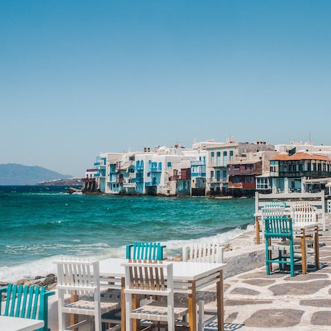 Immerse yourself in an island of beauty – Mykonos old port is a seventeen–minute drive away