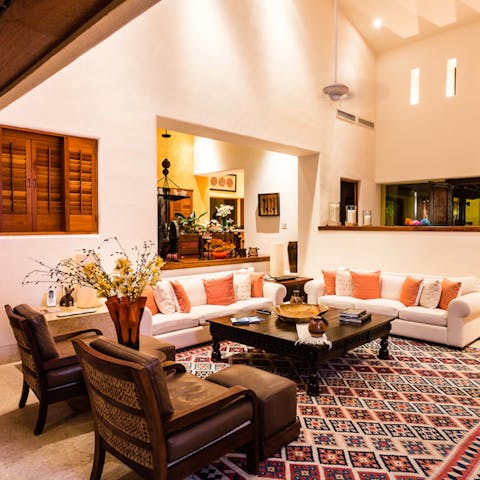 Stretch out in your grand and eclectic living space for a game of cards