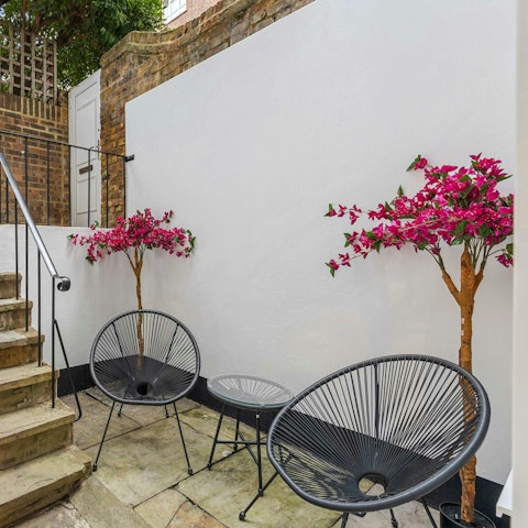 Enjoy a glass of wine on the small terrace