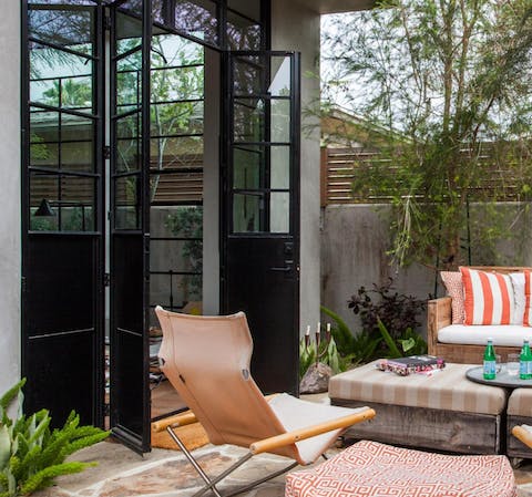 Enjoy an afternoon drink and read in the chic outdoor seating area