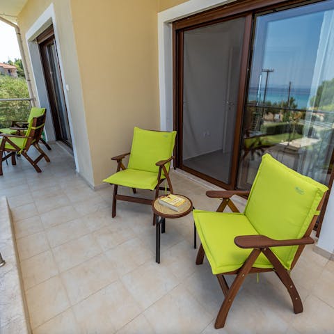Enjoy your morning Frappé coffee on the balcony overlooking the sea