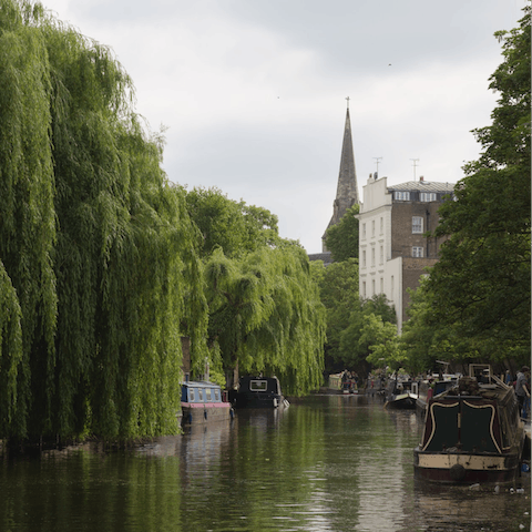 Walk fourteen minutes to the banks of upper Regent's Canal