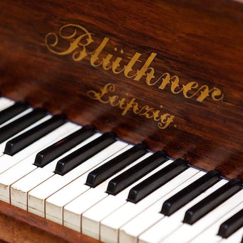 Learn a new tune on the beautiful piano