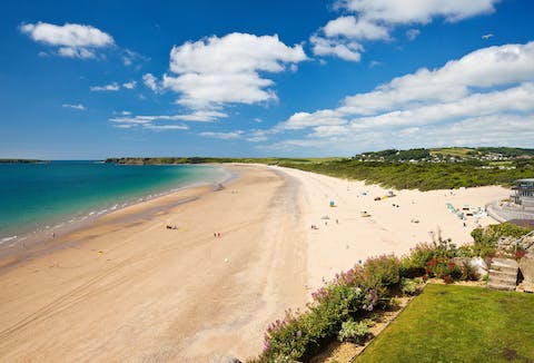 Sink your feet into the sand at South Beach, a short walk from home