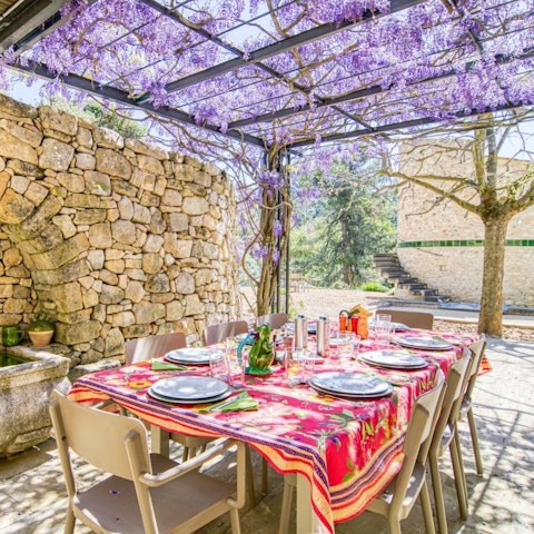 Dine alfresco in the dappled shade on the terrace