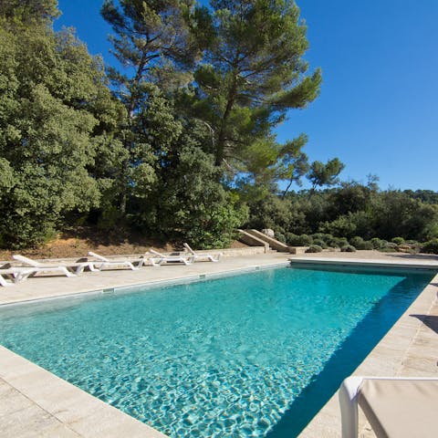 Swim lengths in the crystalline waters of the 12 metre pool