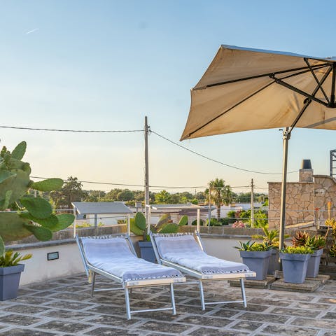 Soak up the sunshine on the terrace then cool down in the outdoor shower