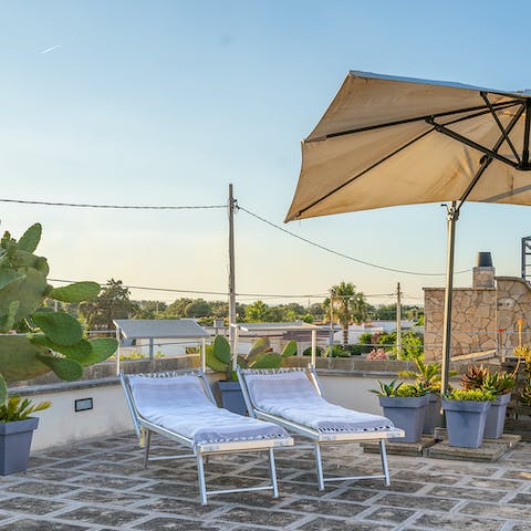 Soak up the sunshine on the terrace then cool down in the outdoor shower