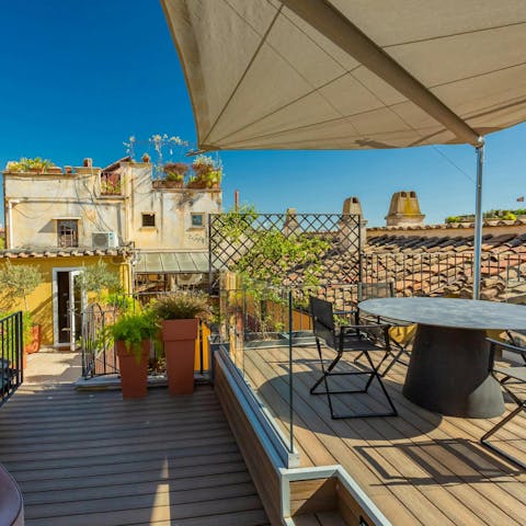 Relax on the private terrace with a glass of Prosecco