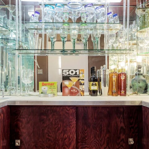 Mix yourself a martini at the drinks cabinet