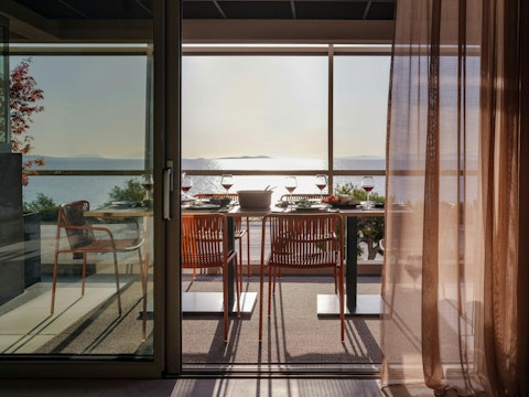 Watch the sun sink across the water from the terrace
