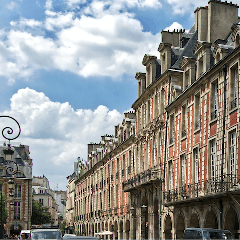 Stroll ten minutes to Place des Vosges for a picnic in the park