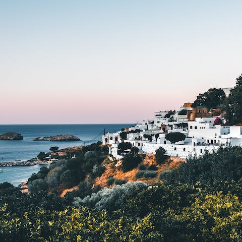 Explore the beautiful old town of Rhodes – less than a thirty-minute drive away