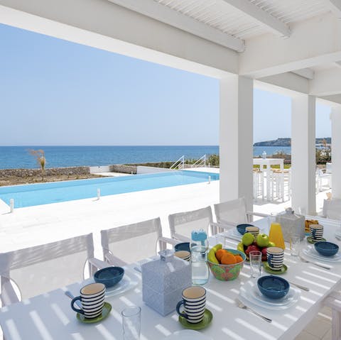 Gather for dreamy sunset drinks and delicious Greek meals on the terrace