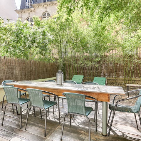 Relax in the private garden with a glass of Beaujolais