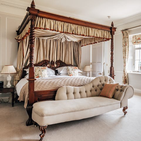 Sleep soundly in the canopied master bed