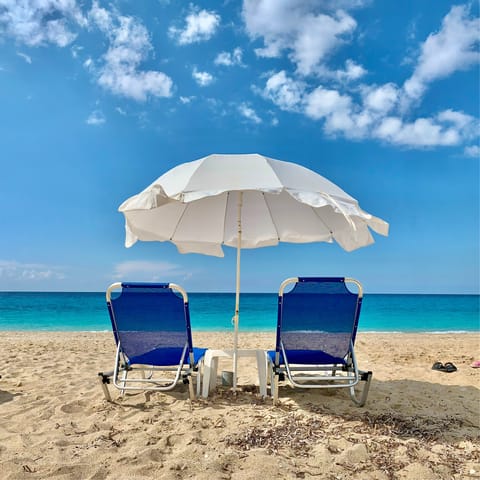 Avoid the crowded sands and drive down to nearby Tsoukalades Beach