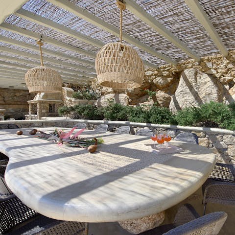 Enjoy a long, lazy lunch beneath the bamboo pergola