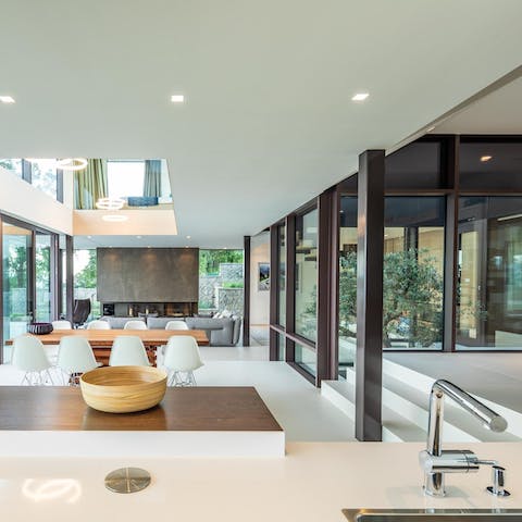Enjoy open-plan living and a connection to nature with the beautiful tree feature