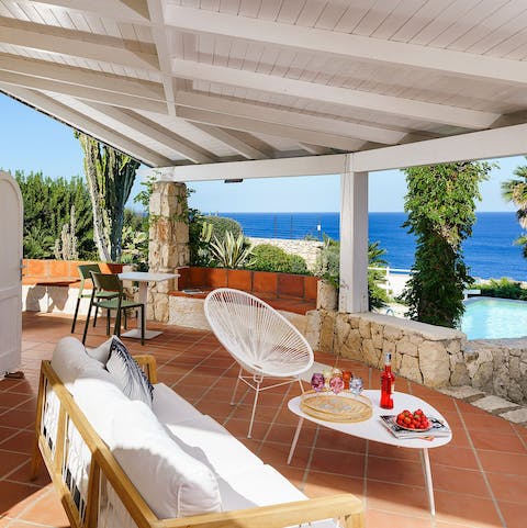 Retreat from the heat with a cool drink on the patio