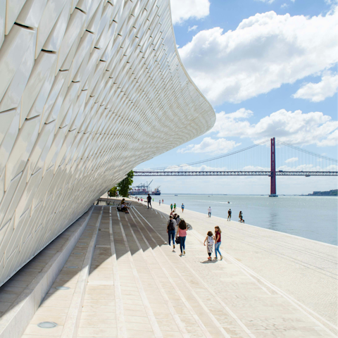 Take a stroll along the river to the MAAT Museum