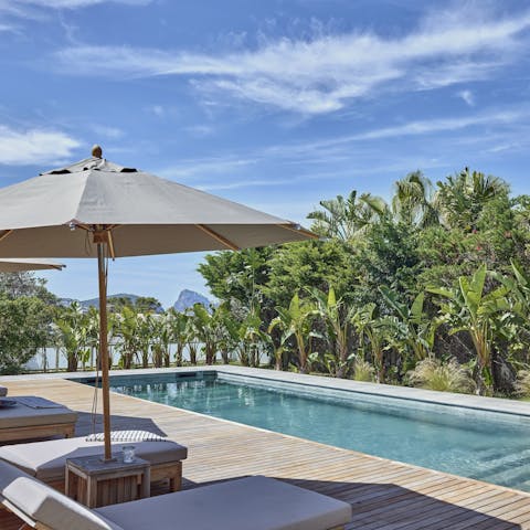 Head to Cala Conta beach or spend slow days by the pool