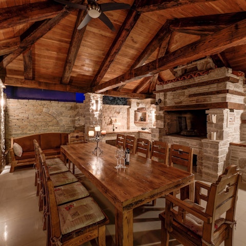 Dine by candlelight in the covered outdoor terrace