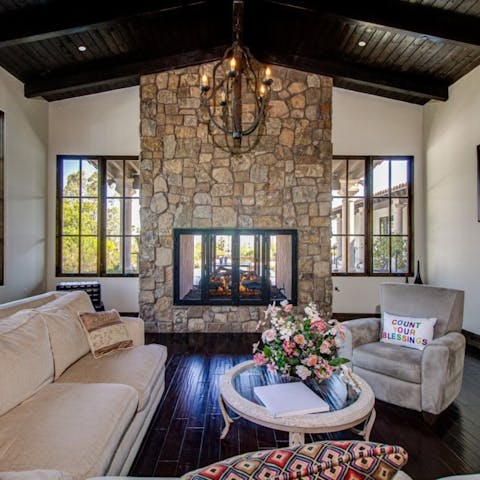 Cosy up by the fire in the living room