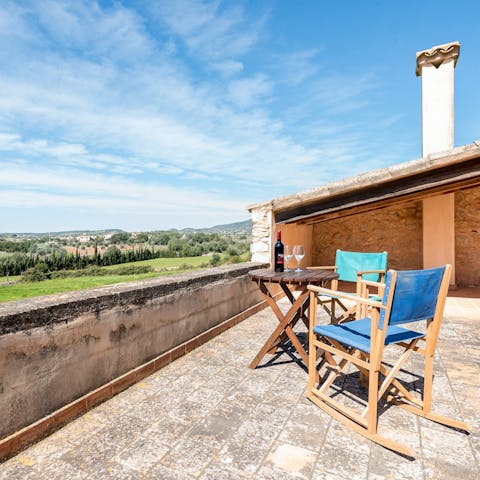 Pour yourself a glass of wine and watch dusk fall over the landscape