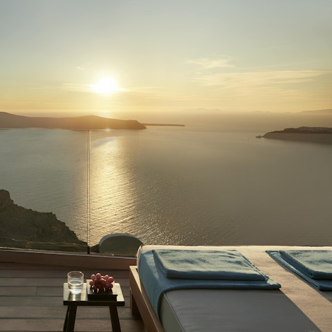 Relax on the terrace overlooking the caldera