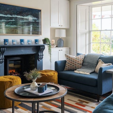 Sit back with a glass of wine and a good book by the electric wood-burner