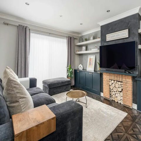 Cosy up with a good film in the homely living room