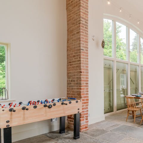 While away rainy afternoons on the foosball or pool table