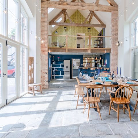 Dine in the wonderfully bright double-height dining room