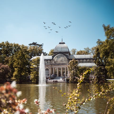 Explore the beautiful El Retiro Park, just a ten-minute walk away