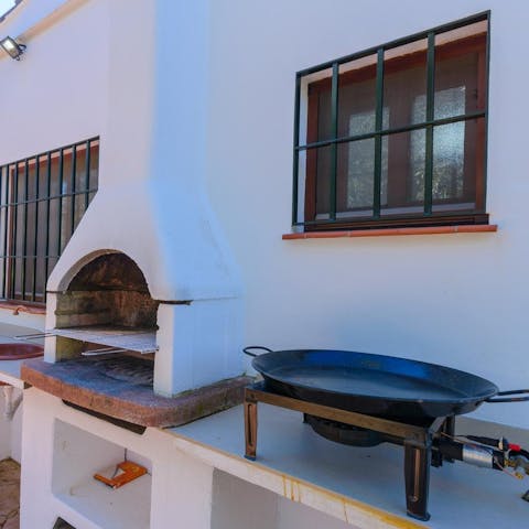 Have a go at cooking some Spanish paella on the outdoor kitchen