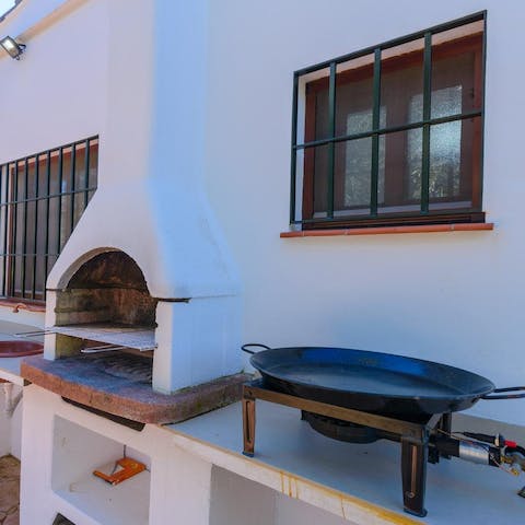 Have a go at cooking some Spanish paella on the outdoor kitchen