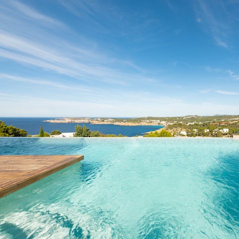 Cool off in the infinity pool overlooking the bay