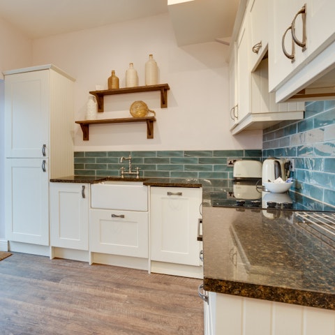 Visit the local fishmonger and cook the catch of the day in the full kitchen