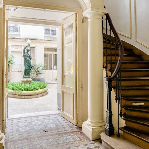 Stay in a 19th-century building brimming with Parisian charm