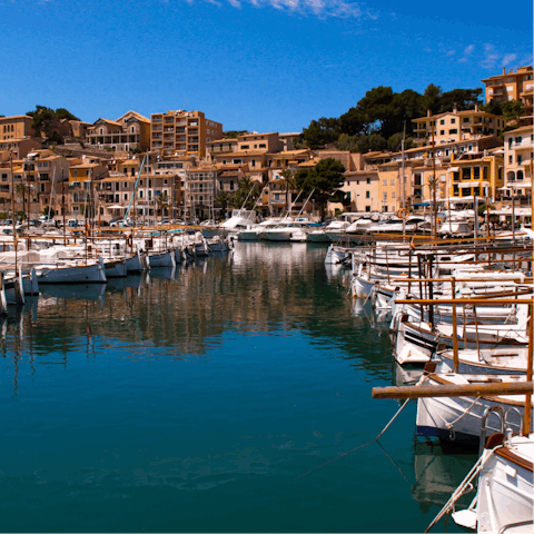 Visit the town of Sóller, about a fifty-minute drive away