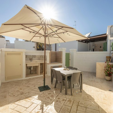 Enjoy breakfast and barbecues on the sunny patio