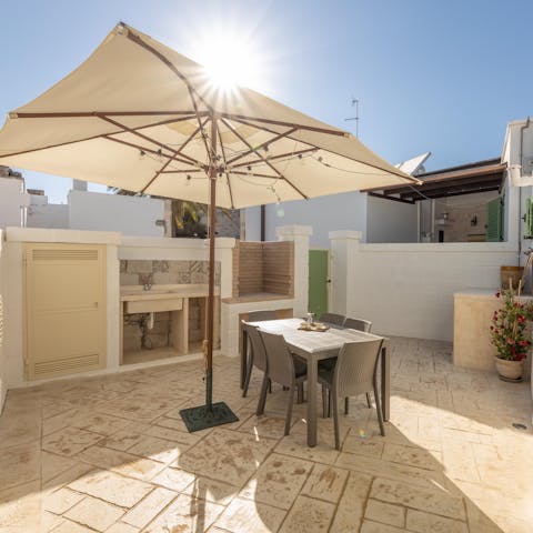 Enjoy breakfast and barbecues on the sunny patio