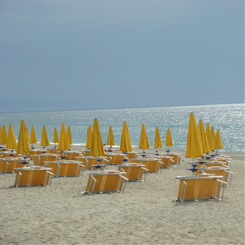 Stretch out on the sand – Guidaloca Bay is just 2 kilometres away