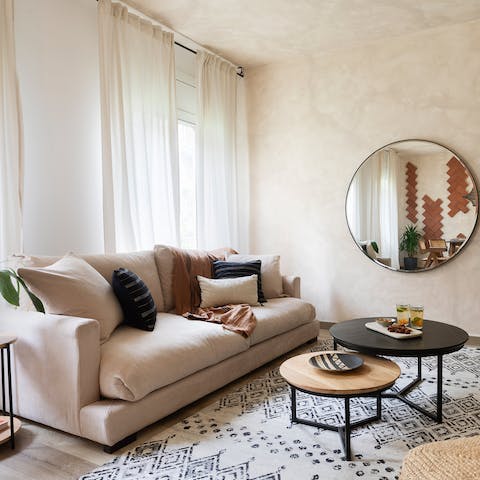 Unwind in the living room after a day of exploring while a record serenades you