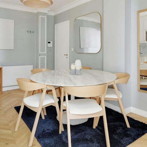 Enjoy a French baguette and cheese for lunch at the dining table